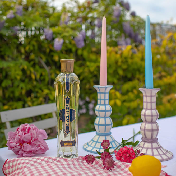 Elevate hosting at home with a set of two Lumière candle holders and a bottle of St-Germain Edelflower liqueur 70cl to add unexpected flavour to your favourite cocktail. St-Germain liqueur official store