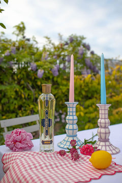 Elevate hosting at home with a set of two Lumière candle holders and a bottle of St-Germain Edelflower liqueur 70cl to add unexpected flavour to your favourite cocktail. St-Germain liqueur official store